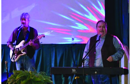 David East performing with Paul Rigdon during David's solo ministry